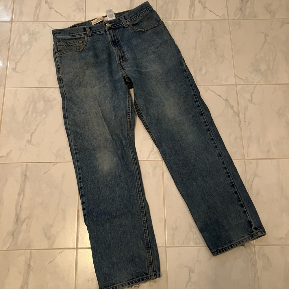 Levis 505 regular fit blue denim jeans. Red tab.  Preloved. Distressed.
